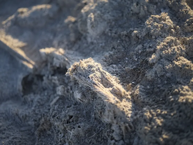 A mass of fine gray powder or ash, almost certainly industrial or combustion byproduct, photographed at extreme proximit