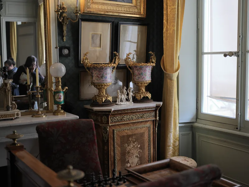 A corner of a period French interior — almost certainly a museum room, likely a 19th-century Parisian hôtel particulier 
